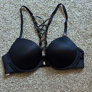 Victoria’s Secret black push-up bra with front clasp enclosure